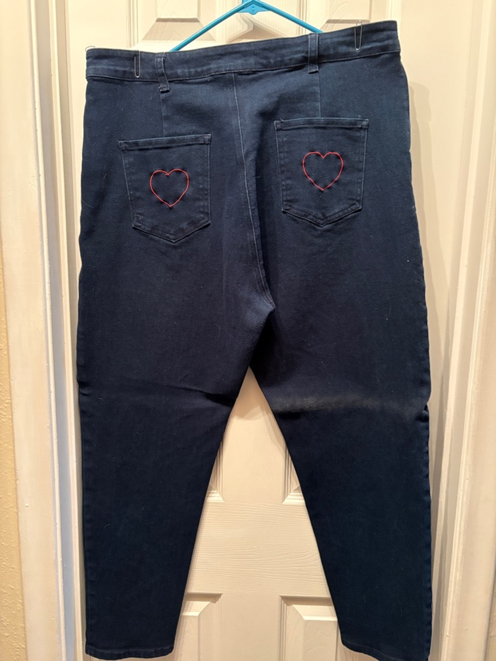 Collectif Navy Skinny Jeans with Red Heart Pocket Stitching vintage style